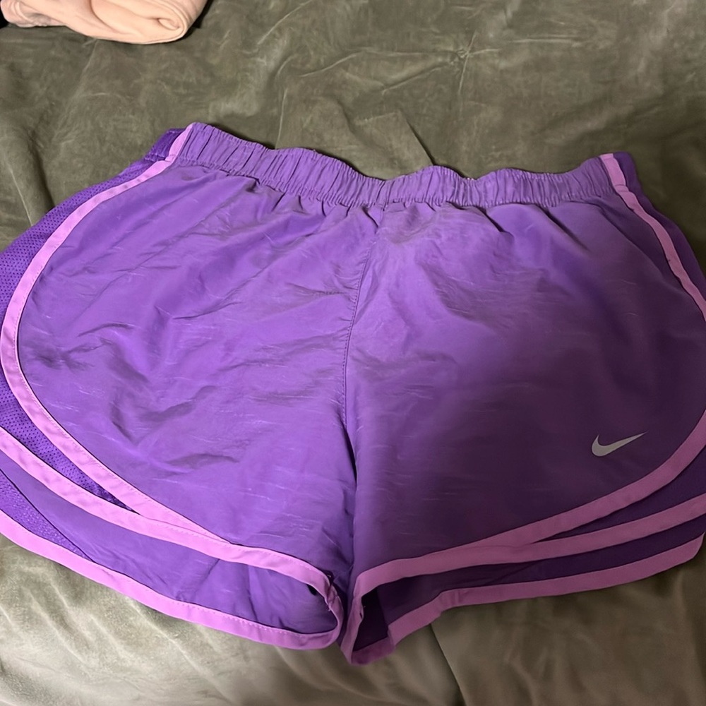 Purple Nike shorts with light purple details